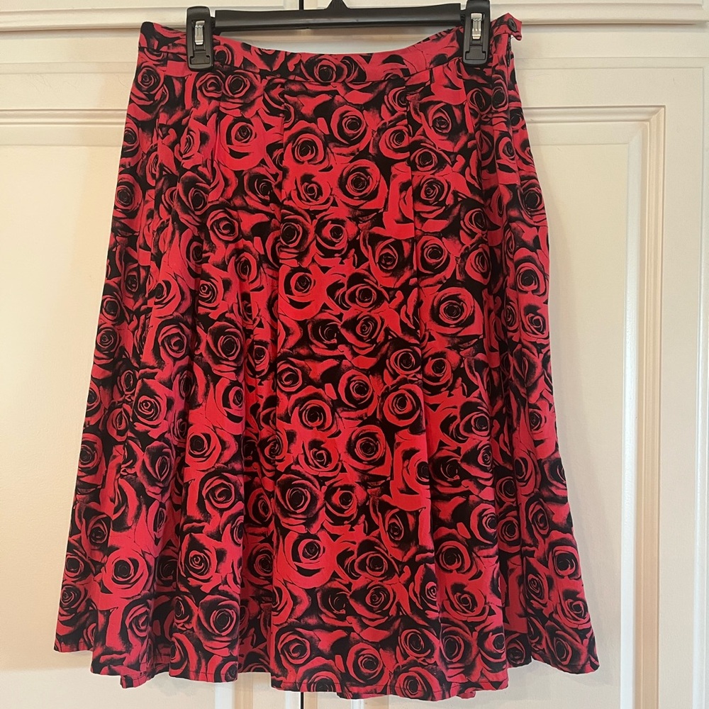 Agnes b red and black flowered skirt.